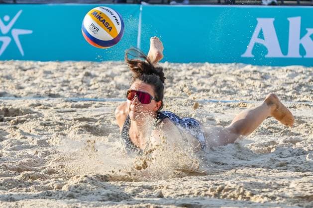 (240414) -- LAGUNA PROVINCE, April 14, 2024 -- Germany s Anna-Lena Grune saves the ball during the women s gold medal match between Chenoa Christ Anna-Lena Grune of Germany and Alaina Chacon Mariah Whalen of the United States at the Volleyball World Beach Pro Tour Futures in Laguna Province, the Philippines, April 14, 2024. ) (SP)THE PHILIPPINES-LAGUNA PROVINCE Beach volleyball, Beachvolleyball BEACH PRO TOUR FUTURES-GOLD MEDAL MATCH ROUELLExUMALI 