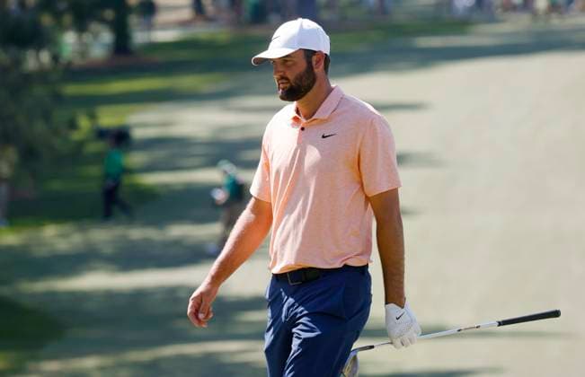 Scottie Scheffler walks onto the green on the seventh hole on the final day of the Masters Tournament at Augusta National Golf Club in Augusta, Georgia on Sunday, April 14, 2024.  AUG20240414528 TANNENxMAURY