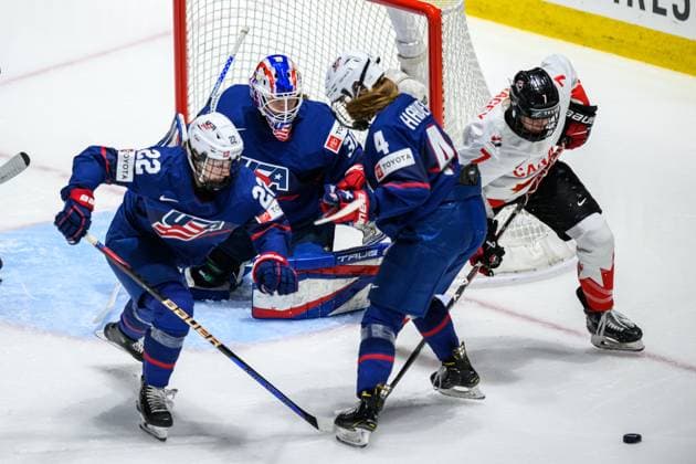 240414 Tessa Janecke, goaltender Aerin Frankel and Caroline Harvey of USA against Laura Stacey of Canada during the 2024 IIHF Women s World Championship final between USA and Canada on April 14, 2024 in Utica Photo Aron Broman BILDBYRAN COP 341 AM0053 ishockey ice hockey vm dam 2024 iihf womens world championship dam vm ishockey vm final usa canada kanada women bbeng  Copyright: ARONxBROMAN BB240414AM087