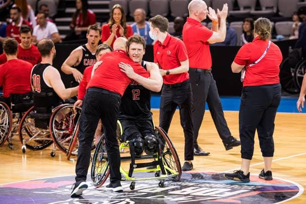 2024 IWBF Mens Repechage Italy Kanda 15 04 2024 Canadians cheer after beating Italy Matteo Feriani Coach Canada hugs Patrick Anderson Canada, 12 2024 IWBF Mens Repechage Italy Kanda Azur Arena, Antibes Copyright: xBEAUTIFULxSPORTS Wunderlx