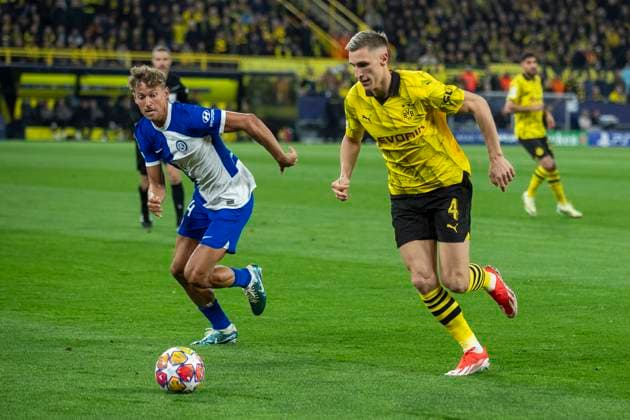 UEFA Champions League, Borussia Dortmund Atletico Madrid, 16 04 2023 Nico Schlotterbeck Borussia Dortmund, 4 , Marcos Llorente Atletico Madrid, 14 UEFA Champions League, Borussia Dortmund Atletico Madrid, second leg quarter-final, on 16 04 2023, Signal Iduna Park, Dortmund UEFA regulations prohibit any use of photographs as image sequences and or quasi video Copyright: xBEAUTIFULxSPORTS Meuselx