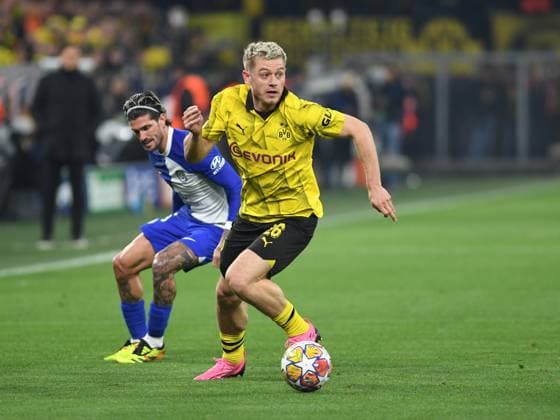 16 04 2024, Dortmund, Germany, Signal Iduna Park, Borussia Dortmund vs Atletico Madrid UEFA Champions League 2023 24 Quarter final Second Leg, Rodrigo de Paul Atletico Madrid and Julian Ryerson Borussia Dortmund in a duel Photo Ralf Treese Dortmund Signal Iduna Park North Rhine Westphalia Germany 521_BVBATM20240416_009 Treese-521