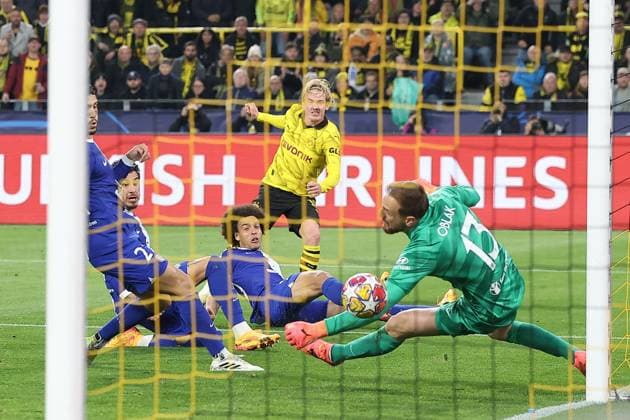 Julian Brandt of Borussia Dortmund scores the opening goal Borussia Dortmund v Atletico Madrid, UEFA Champions League, Quarter Final, Second Leg, Football, Signal Iduna Park, Dortmund, Germany - 16 Apr 2024 EDITORIAL USE ONLY No use with unauthorised audio, video, data, fixture lists, club league logos or live services. Online in-match use limited to 120 images, no video emulation. No use in betting, games or single club league player publications.  Copyright: xMichaelxZemanek Shutterstockx 14434932l