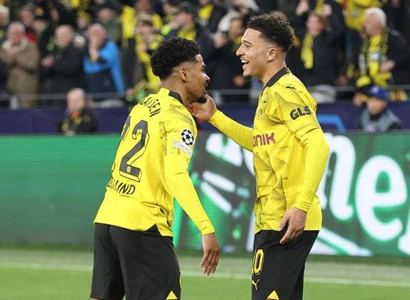 Jadon Sancho of Borussia Dortmund celebrates scoring his sides second goal with team-mate Ian Maatsen Borussia Dortmund v Atletico Madrid, UEFA Champions League, Quarter Final, Second Leg, Football, Signal Iduna Park, Dortmund, Germany - 16 Apr 2024 EDITORIAL USE ONLY No use with unauthorised audio, video, data, fixture lists, club league logos or live services. Online in-match use limited to 120 images, no video emulation. No use in betting, games or single club league player publications.  Copyright: xMichaelxZemanek Shutterstockx 14434932s