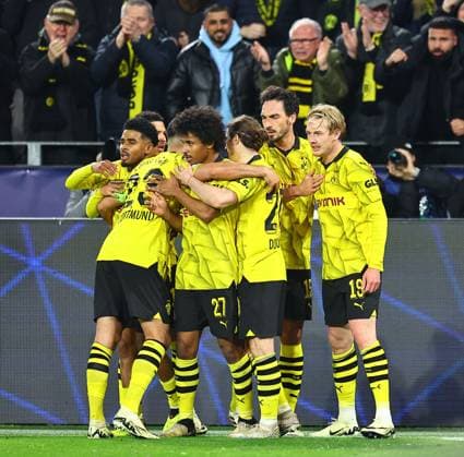 Julian Brandt of Borussia Dortmund celebrates scoring the opening goal with team-mates Borussia Dortmund v Atletico Madrid, UEFA Champions League, Quarter Final, Second Leg, Football, Signal Iduna Park, Dortmund, Germany - 16 Apr 2024 EDITORIAL USE ONLY No use with unauthorised audio, video, data, fixture lists, club league logos or live services. Online in-match use limited to 120 images, no video emulation. No use in betting, games or single club league player publications.  Copyright: xMichaelxZemanek Shutterstockx 14434932aa