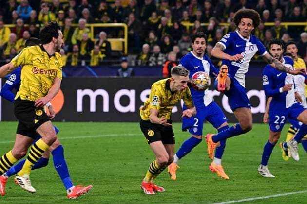 Nico Schlotterbeck 4 Borussia Dortmund in duel, action, with Axel Witsel 20 Atletico Madrid , Borussia Dortmund vs Atletico Madrid, Football, Champions League, Round of 16, 16 04 2024 Dortmund Nordrhein Westfalen Germany Copyright: xkolbert-press MarcxNiemeyerx