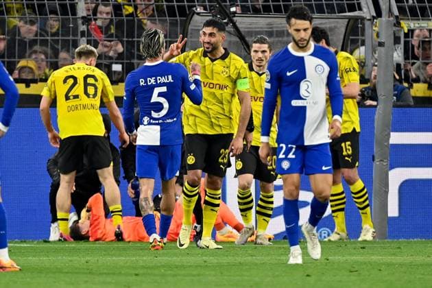 16 04 2024, xjrdrx, football UEFA Champions League, Borussia Dortmund Atletico Madrid emspor, v l pack formation after clash Cesar Azpilicueta Atletico Madrid with Gregor Kobel Borussia Dortmund Rodrigo de Paul Atletico Madrid Emre Can Borussia Dortmund gesticulates gives instructions with arms gesticulates gives instructions, gesticulate DFL DFB REGULATIONS PROHIBIT ANY USE OF PHOTOGRAPHS as IMAGE SEQUENCES and or QUASI VIDEO Dortmund