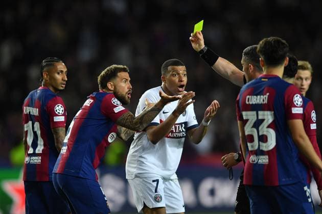 FC Barcelona, Barca v PARIS SAINT-GERMAIN OLIMPIC STADIUM LLUIS COMPANYS. MONTJUIC,BARCELONA. APRIL 16,2024 FC BARCELONA vs PARIS SAINT-GERMAIN April 16,2024 (07) Kylian Mbappe of PSG and Ãnigo Martinez (5 ) of FC Barcelonam reacts during the soccer match corresponding to the quarter-final tie of the Champions League between FC Barcelona and Paris Saint-Germain at Olimpic Stadium Lluis Companys of MontjuÃ¯c in Barcelona, Spain. Barcelona ESP Copyright: xS.xRosx