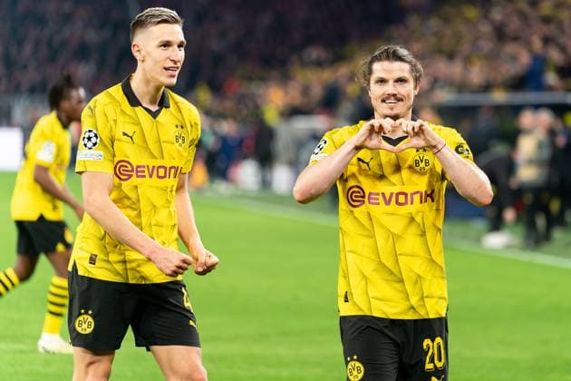 2024-04-16 Borussia Dortmund v Atletico Madrid - Quarter-final Second Leg - UEFA Champions League 2023 24 DORTMUND, GERMANY - APRIL 16: Marcel Sabitzer of Borussia Dortmund celebrates after scoring the team s fourth goal with Nico Schlotterbeck of Borussia Dortmund during the Quarter-final Second Leg - UEFA Champions League 2023 24 match between Borussia Dortmund and Atletico Madrid at Signal Iduna Park on April 16, 2024 in Dortmund, Germany. (Photo by Joris Verwijst BSR Agency) Dortmund Germany Content not available for redistribution in The Netherlands directly or indirectly through any third parties. Copyright: xBSRxAgencyx