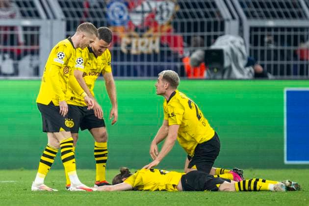 Soccer Champions League quarter-final second leg, Borussia Dortmund Atletico Madrid on 16 April 2024 at Signal Iduna Park Dortmunds Marco Reus l r , Dortmunds Salih Özcan, Dortmunds Marcel Sabitzer and Dortmunds Julian Ryerson cheer after the final whistle IMPORTANT NOTE In accordance with UEFA regulations, it is prohibited to use or have used photographs taken in the stadium and or of the match in the form of sequential images and or video-like photo series Copyright: xKirchner DavidxInderliedx
