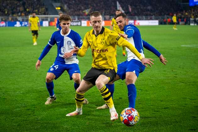 Soccer Champions League quarter-final second leg, Borussia Dortmund Atletico Madrid on 16 April 2024 at Signal Iduna Park Madrids Pablo Barrios l r , Dortmunds Marco Reus and Madrids Saul fight for the ball IMPORTANT NOTE In accordance with UEFA regulations, it is prohibited to use or have used photographs taken in the stadium and or of the match in the form of sequential images and or video-like photo series Copyright: xKirchner DavidxInderliedx