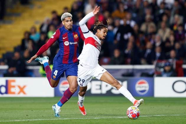 Ronald Araujo (Barcelona), Bradley Barcola (PSG), APRIL 16, 2024 - Football Soccer : UEFA Champions League round of 8 2nd leg match between FC Barcelona, Barca 1-4 Paris Saint-Germain at the Estadi Olimpic Lluis Companys in Barcelona, Spain. Noxthirdxpartyxsales  (250393719)