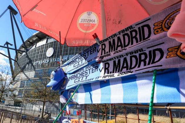 Manchester City v Real Madrid Champions League 17 04 2024. Quarter Final Matchday scarves for sale outside the stadium ahead of the Champions League quarter-final second leg match between Manchester City and Real Madrid at the Etihad Stadium, Manchester, England on 17 April 2024. Manchester Etihad Stadium Manchester England Editorial use only , Copyright: xConorxMolloyx PSI-19472-0001