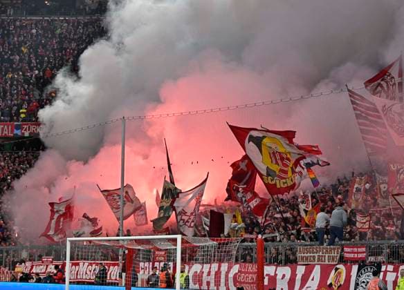 17 04 2024, Football UEFA Championsleague 2023 2024 Quarterfinals, FC Bayern Munich FC Arsenal London, in the Allianz Arena Munich Phyros in the South Curve DFL and DFB regulations prohibit any use of photographs as image sequences and or quasi video
