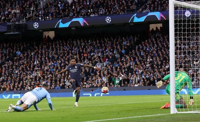 Sport Bilder des Tages 17th April 2024; Etihad Stadium, Manchester, England; Champions League Football, Quarter Final, Manchester City versus Real Madrid; Rodrygo of Real Madrid shoots and scores the opening goal for 0-1 after 12 minutes  ActionPlus12631396 DavidxBlunsden