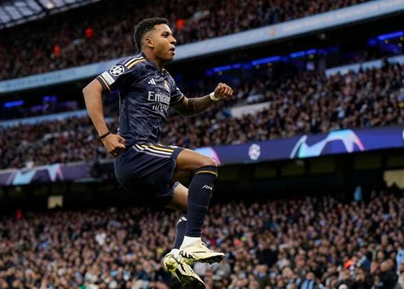 Manchester, England, 17th April 2024. Rodrygo of Real Madrid celebrates scoring the first goal of the night during the UEFA Champions League Quarter Final 2nd Leg match at the Etihad Stadium, Manchester. Picture credit should read: Andrew Yates Sportimage EDITORIAL USE ONLY. No use with unauthorised audio, video, data, fixture lists, club league logos or live services. Online in-match use limited to 120 images, no video emulation. No use in betting, games or single club league player publications. SPI-3082-0043