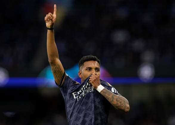 Manchester, England, 17th April 2024. Rodrygo of Real Madrid celebrates scoring the first goal of the night during the UEFA Champions League Quarter Final 2nd Leg match at the Etihad Stadium, Manchester. Picture credit should read: Andrew Yates Sportimage EDITORIAL USE ONLY. No use with unauthorised audio, video, data, fixture lists, club league logos or live services. Online in-match use limited to 120 images, no video emulation. No use in betting, games or single club league player publications. SPI-3082-0045