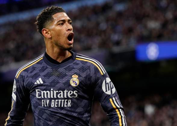 Manchester, England, 17th April 2024. Jude Bellingham of Real Madrid celebrates the first goal during the UEFA Champions League Quarter Final 2nd Leg match at the Etihad Stadium, Manchester. Picture credit should read: Andrew Yates Sportimage EDITORIAL USE ONLY. No use with unauthorised audio, video, data, fixture lists, club league logos or live services. Online in-match use limited to 120 images, no video emulation. No use in betting, games or single club league player publications. SPI-3082-0052