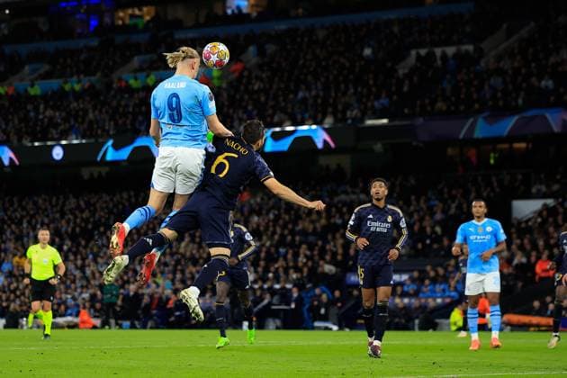 Manchester City v Real Madrid Champions League 17 04 2024. Quarter Final Erling Haaland (9) of Manchester City jumps for a header during the Champions League quarter-final second leg match between Manchester City and Real Madrid at the Etihad Stadium, Manchester, England on 17 April 2024. Manchester Etihad Stadium Manchester England Editorial use only , Copyright: xConorxMolloyx PSI-19472-0039