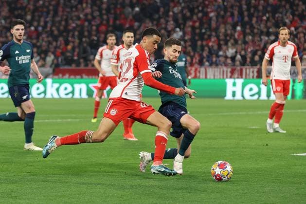 in duel, action, with Jamal Musiala 42 FC Bayern Muenchen , Jorginho 20 FC Arsenal London , FC Bayern Muenchen vs FC Arsenal, Champions League, football, quarter-final, second leg, 17 04 2024 Muenchen Bayern Germany Copyright: xkolbert-press ChristianxKolbertx