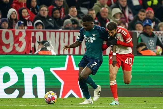 Munich, Germany, April 17th 2024: Bukayo Saka (7 Arsenal) and Noussair Mazraoui (40 Bayern Munich) battle for the ball (duel) during the UEFA Champions League quarterfinal football match between FC Bayern Munich and Arsenal FC at Allianz Arena in Munich, Germany. (Daniela Porcelli SPP) Copyright: xDanielaxPorcellix xSPPx spp-en-DaPoSp-20240417-DP108773