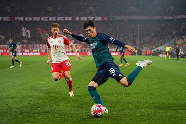 Munich, Germany, April 17th 2024: Takehiro Tomiyasu (18 Arsenal) shoots the ball during the UEFA Champions League quarterfinal football match between FC Bayern Munich and Arsenal FC at Allianz Arena in Munich, Germany. (Daniela Porcelli SPP) Copyright: xDanielaxPorcellix xSPPx spp-en-DaPoSp-20240417-DP301169