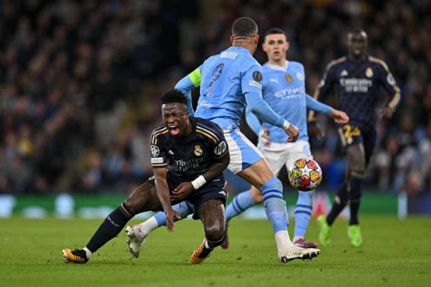 Vinicius Junior of Real Madrid reacts to a tackle by Kyle Walker of Manchester City during the UEFA Champions League semi final return leg football match between Manchester City and Real Madrid at the Etihad Stadium in Manchester England (Will Palmer SPP) Copyright: xWillxPalmer SPPx spp-en-WiPa-WP9_8522
