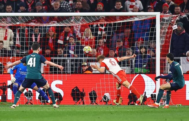 Joshua Kimmich of Bayern Munich scores the opening goal Bayern Munich v Arsenal, UEFA Champions League, Quarter Final, Second Leg, Football, Allianz Arena, Munich, Germany - 17 Apr 2024 EDITORIAL USE ONLY No use with unauthorised audio, video, data, fixture lists, club league logos or live services. Online in-match use limited to 120 images, no video emulation. No use in betting, games or single club league player publications.  Copyright: xMichaelxZemanek Shutterstockx 14434936x