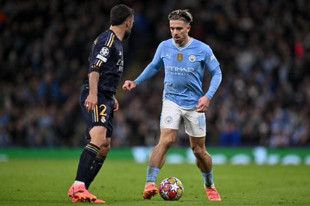Jack Grealish of Manchester City battles for possession with Dani Carvajal of Real Madrid during the UEFA Champions League semi final return leg football match between Manchester City and Real Madrid at the Etihad Stadium in Manchester England (Will Palmer SPP) Copyright: xWillxPalmer SPPx spp-en-WiPa-WP9_8794