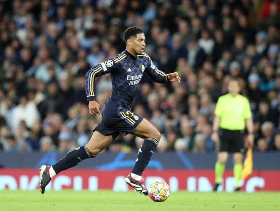 17th April 2024; Etihad Stadium, Manchester, England; Champions League Football, Quarter Final, Manchester City versus Real Madrid; Jude Bellingham of Real Madrid runs with the ball  ActionPlus12631414 DavidxBlunsden