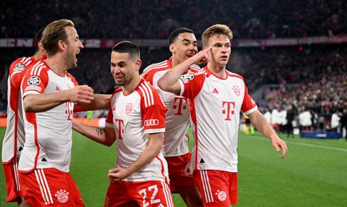 FOOTBALL CHAMPIONS LEAGUE SEASON 2023 2024 Quarter-final second leg FC Bayern Muenchen FC Arsenal London 17 04 2024 FC Bayern Muenchen cheering after the 1-0 goal Harry Kane, Raphael Guerreiro, Jamal Musiala, goal scorer Joshua Kimmich from left