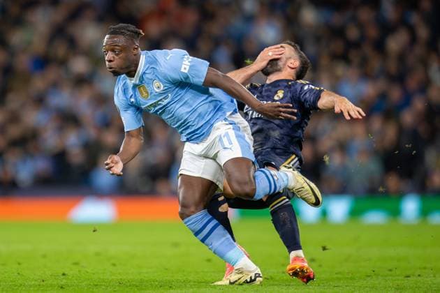 Sport Bilder des Tages Manchester City v Real Madrid Champions League 17 04 2024. Quarter Final Manchester City forward JÃ rÃ my Doku (11) fouls Real Madrid defender Daniel Carvajal (2) during the Champions League quarter-final second leg match between Manchester City and Real Madrid at the Etihad Stadium, Manchester, England on 17 April 2024. Editorial use only , Copyright: xIanxStephenx PSI-19482-0044