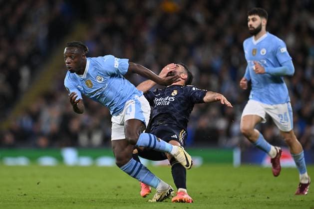 Dani Carvajal of Real Madrid reacts after battling for possession with JÃ rÃ my Doku of Manchester City during the UEFA Champions League semi final return leg football match between Manchester City and Real Madrid at the Etihad Stadium in Manchester England (Will Palmer SPP) Copyright: xWillxPalmer SPPx spp-en-WiPa-WP9_9562