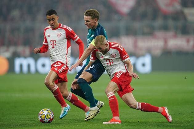 Munich, Germany, April 17th 2024: Jamal Musiala (42 Bayern Munich) and Konrad Laimer (27 Bayern Munich) against Martin Odegaard (8 Arsenal) during the UEFA Champions League quarterfinal football match between FC Bayern Munich and Arsenal FC at Allianz Arena in Munich, Germany. (Daniela Porcelli SPP) Copyright: xDanielaxPorcellix xSPPx spp-en-DaPoSp-20240417-DP108510