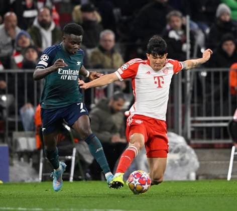 duel, action Bukayo Saka FC Arsenal 07 vs Min jae Kim FC Bayern Muenchen FCB 03 FC Bayern Muenchen FCB vs FC Arsenal quarterfinal second leg 17 04 2024 DFL REGULATIONS PROHIBIT ANY USE OF PHOTOGRAPHS AS IMAGE SEQUENCES AND OR QUASI VIDEO FC Bayern Muenchen FCB vs FC Arsenal