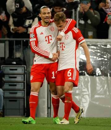 (240418) -- MUNICH, April 18, 2024 -- Leroy Sane (L) of Bayern Munich celebrates with his teammate Joshua Kimmich during the UEFA Champions League quarterfinal 2nd Leg football match between Bayern Munich and Arsenal in Munich, Germany, April 17, 2024. (Photo by Xinhua) (SP)GERMANY-MUNICH-FOOTBALL-UEFA CHAMPIONS LEAGUE-BAYERN MUNICH VS ARSENAL PhilippexRuiz 