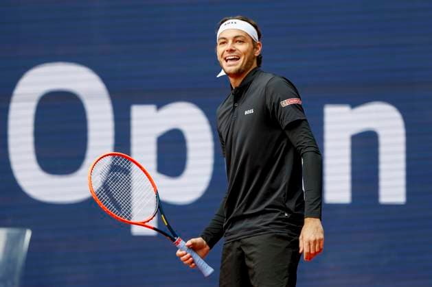 Taylor Fritz laughs after a bounced ball, Copyright: xJuergenxHasenkopfx