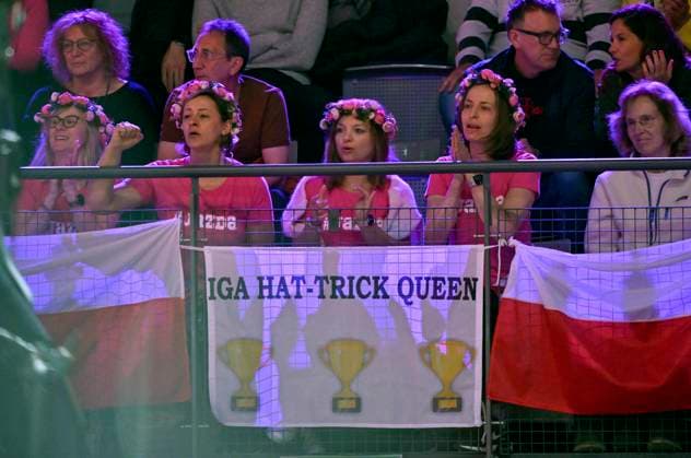 Fanclub Fans of Iga Swiatek POL on the tribune with poster IGA HAT TRICK QUEEN Tennis Ladies Porsche Cup Porsche Tennis Grand Prix GP Stuttgart 2024 Porsche Arena 18 04 2024 DFL REGULATIONS PROHIBIT ANY USE OF PHOTOGRAPHS AS IMAGE SEQUENCES AND OR QUASI VIDEO Porsche Tennis Grand Prix GP Stuttgart 2024