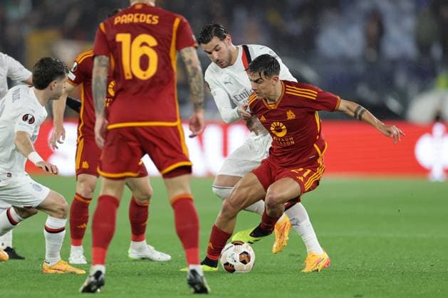UEFA Europa League AS Roma and AC Milan Roma™s Argentinian forward Paulo Dybala challenges for Milan™s French defender Theo Hernandez during the Quarter-Final second leg match between AS Roma and AC Milan at Stadio Olimpico on April 18, 2024 in Rome, Italy. ABPH2205 Copyright: xAntonioxBalascox
