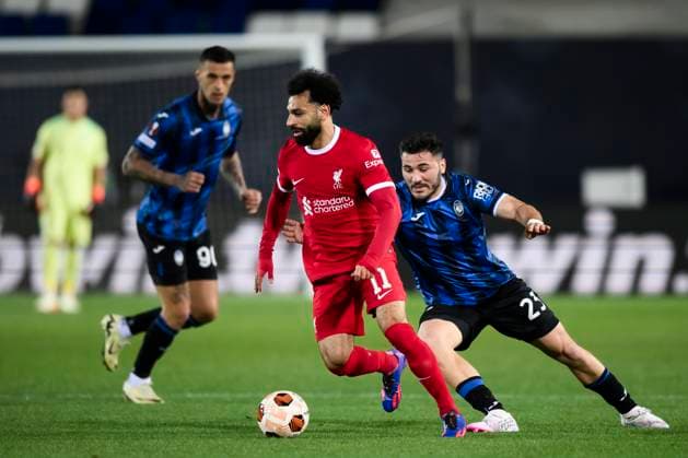 Atalanta BC v Liverpool FC - UEFA Europa League Mohamed Salah of Liverpool FC competes for the ball with Sead Kolasinac of Atalanta BC during the he UEFA Europa League quarter-final second leg football match between Atalanta BC and Liverpool FC. Bergamo Italy Copyright: xNicolòxCampox