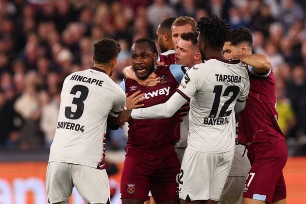 18th April 2024; London Stadium, London, England; Europa League Football, Quarter Final, Second Leg, West Ham United versus Bayer Leverkusen; Michail Antonio of West Ham United clashes with Piero Hincapie and Edmond Tapsoba of Bayer Leverkusen  ActionPlus12631760 ShaunxBrooks