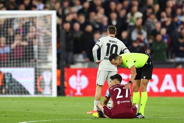 Match referee JosÃ Maria Sanchez Martinez checks on Nayef Aguerd of West Ham United before he is substituted West Ham United v Bayer 04 Leverkusen, UEFA Europa League, Quarter Final, Second Leg, Football, London Stadium, London, UK - 18 Apr 2024 EDITORIAL USE ONLY No use with unauthorised audio, video, data, fixture lists, club league logos or live services. Online in-match use limited to 120 images, no video emulation. No use in betting, games or single club league player publications.  Copyright: xSimonxDael Shutterstockx 14438414x