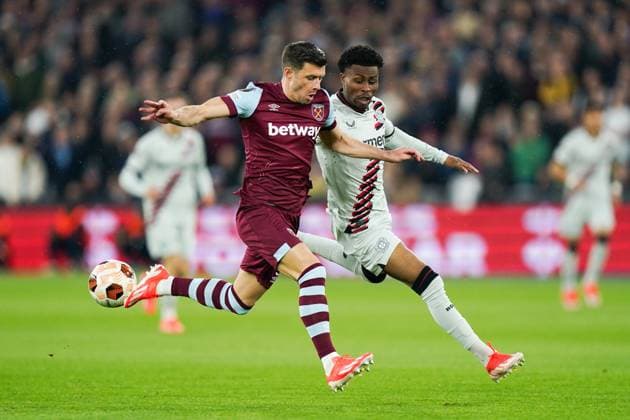 West Ham United FC v Bayer 04 Leverkusen Aaron Cresswell of West Ham United and Nathan Tella of Bayer Leverkusen during the West Ham United FC v Bayer 04 Leverkusen UEFA Europa League Quater-Finals 2nd Leg match at London Stadium, London, England, United Kingdom on 18 April 2024 Editorial use only. All images are copyright Every Second Media Limited. No images may be reproduced without prior permission. Copyright: xIMAGO EveryxSecondxMediax ESM-0986-0022