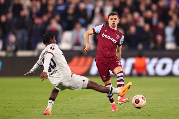 18th April 2024; London Stadium, London, England; Europa League Football, Quarter Final, Second Leg, West Ham United versus Bayer Leverkusen; Jeremie Frimpong of Bayer Leverkusen challenges Aaron Cresswell of West Ham United  ActionPlus12631860 ShaunxBrooks