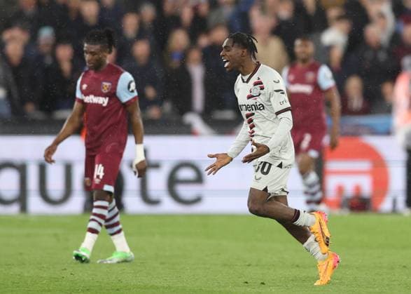 London, England, 18th April 2024. Jeremie Frimpong of Bayer Leverkusen celebrates scoring their goal during the UEFA Europa League match at the London Stadium, London. Picture credit should read: David Klein Sportimage EDITORIAL USE ONLY. No use with unauthorised audio, video, data, fixture lists, club league logos or live services. Online in-match use limited to 120 images, no video emulation. No use in betting, games or single club league player publications. SPI-3091-0055