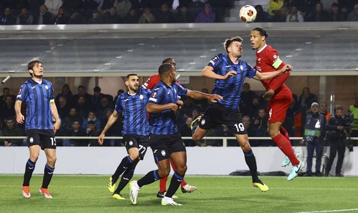 Virgil van Dijk of Liverpool has a header on goal Atalanta v Liverpool, UEFA Europa League, Quarter Final, Second Leg, Football, Gewiss Stadium, Bergamo, Italy - 18 Apr 2024 EDITORIAL USE ONLY No use with unauthorised audio, video, data, fixture lists, club league logos or live services. Online in-match use limited to 120 images, no video emulation. No use in betting, games or single club league player publications.  Copyright: xKieranxMcManus Shutterstockx 14438415df
