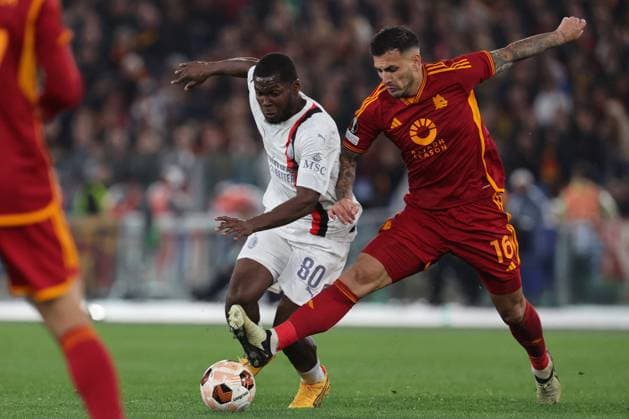 Football Europa League match - AS Roma vs AC Milan Rome, Italy 18.04.2024: Yumus Musah of Milan, Leandro Paredes of Roma during the UEFA Europa League 2023-2024, quarter final , football match between AS Roma vs AC Milan at Olympic Stadium in Rome. Rome Italy  Copyright: xIPAxSport ABACAx