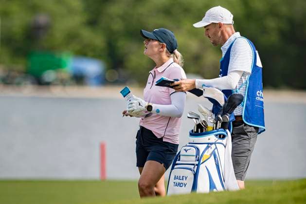 April 18, 2024, The Woodlands, Texas, USA: BAILEY TARDY checks the distance on the 9th fairway during round 1 of The Chevron Championship at The Club at Carlton Woods on April 18, 2024, in The Woodlands, Texas. The Woodlands USA - ZUMAp213 20240418_znp_p213_078 Copyright: xLynnxPenningtonx