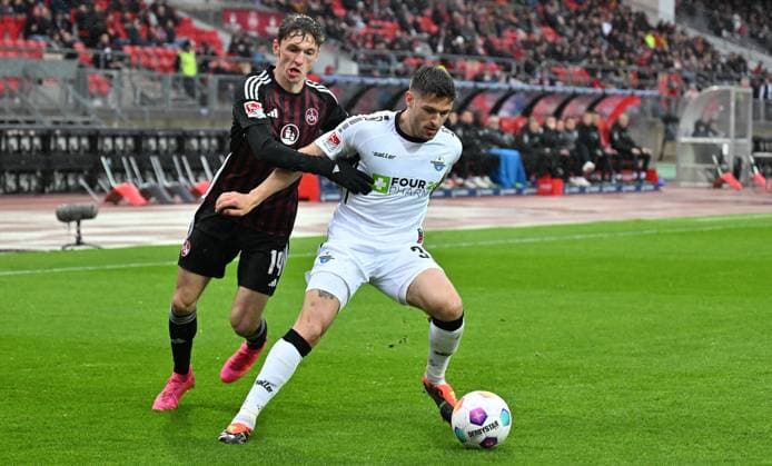 19 04 2024 Soccer Season 2023 2024 2 Soccer Bundesliga 30 Matchday 1 FC Nürnberg FCN Club SC Paderborn 07 SCP Sportfoto Zink xwoxzix DFL regulations prohibit any use of photographs as image sequences and or quasi video only for editorial use Benjamin Goller 14, 1 FC Nürnberg FCN Marcel Hoffmeier 33, SC Paderborn