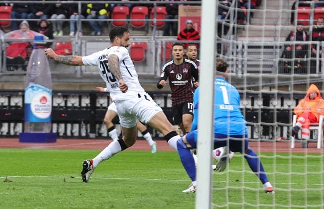 19 04 2024 Soccer Season 2023 2024 2 Soccer Bundesliga 30 Matchday 1 FC Nuremberg FCN Club SC Paderborn 07 SCP Sportfoto Zink DaMa xdaxmax DFL regulations prohibit any use of photographs as image sequences and or quasi video only for editorial use Goal Goal Shot to 0 1 Goalscorer Adriano Grimaldi 39, SC Paderborn vs Carl Klaus 1, 1 FC Nuremberg FCN